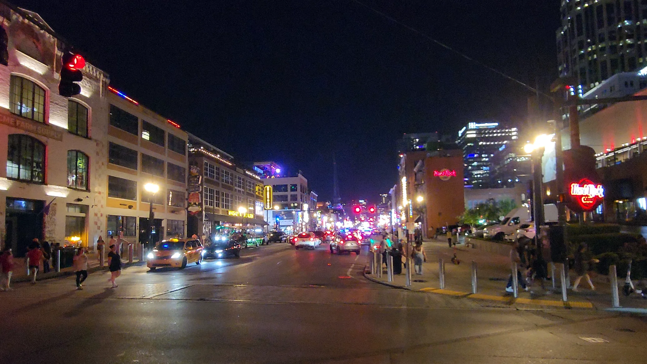 Lower Broadway reaches the Cumberland River at the eastern end of the bar district.