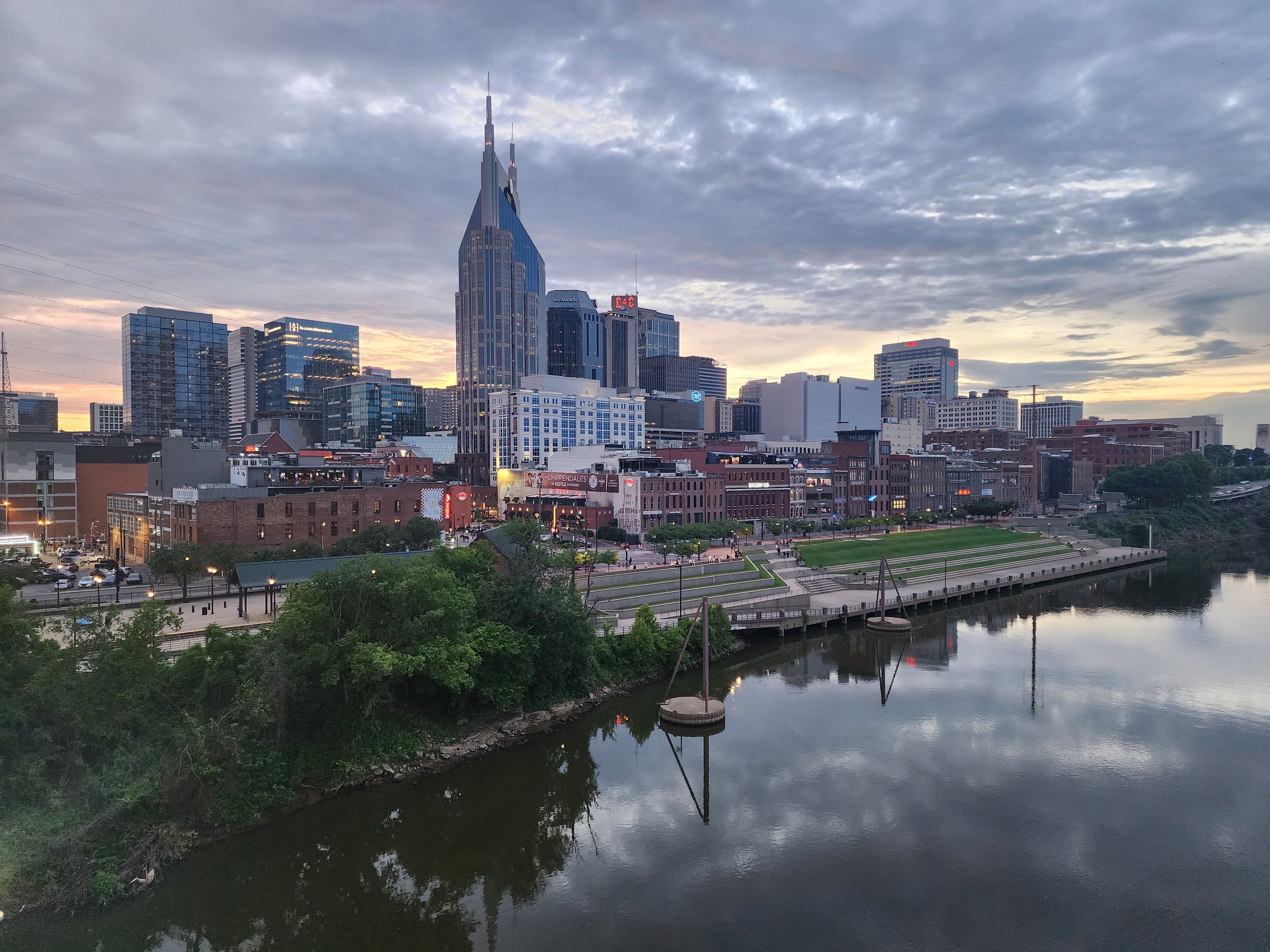 Downtown Nashville skyline and riverfront viewed across the Cumberland River.